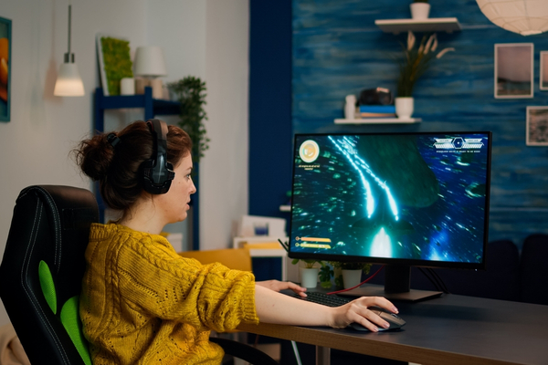 Gaming business owner reviewing secure payment reports and player transaction insights